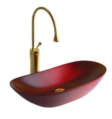 China Modern New Design Boat Shape Matte Burgundy Bathroom Sink Ceramic Oval Wash Basin for sale