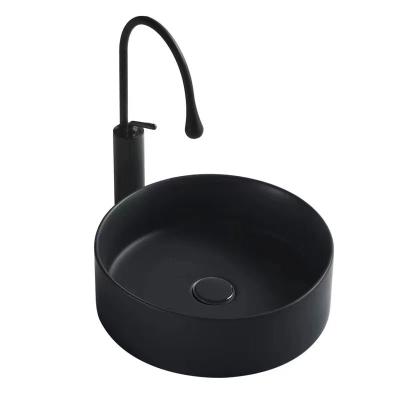 China Modern European Style Matte Black Round Wash Basin Ceramic Hand Wash Sink for sale