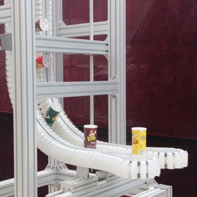 China Heat Resistant Vertical Clamping Conveyors Bottle Lifting Up Handle Conveyor Lifter Cans Gripping Conveyor for sale