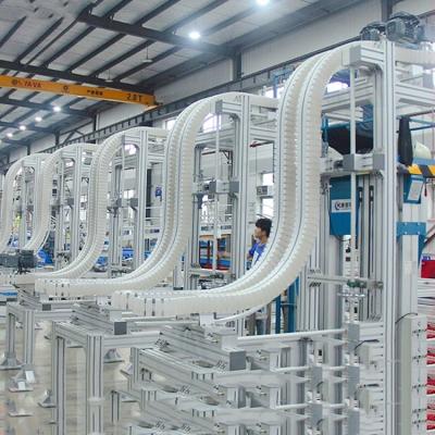 China Heat Resistant Vertical Clamping Conveyors Bottle Lifting Up Handle Conveyor Lifter Cans Gripping Conveyor for sale