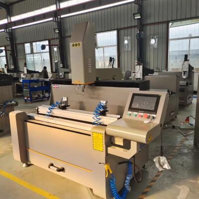 China 1200mm Aluminum Window Door Making Machine Cnc Copy Router Milling And Drilling Machinery For Aluminium Fabrication for sale