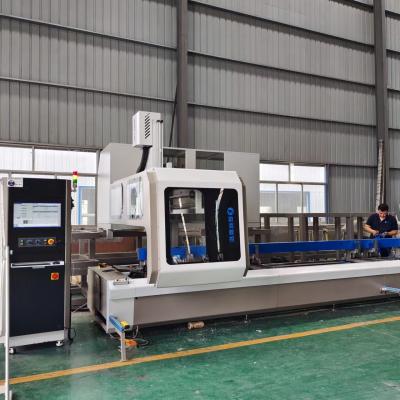 China Aluminium And Upvc 4 Axis CNC Machining Center With 300mm Saw Balde for drilling and cutting aluminium profile for sale