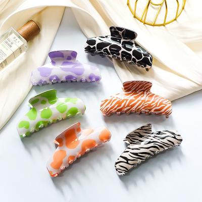 China Hair decoration Hot Sale in Autumn 11cm New Fashion Cow Pattern Acrylic Claw Clip Women's Hair Clip for sale