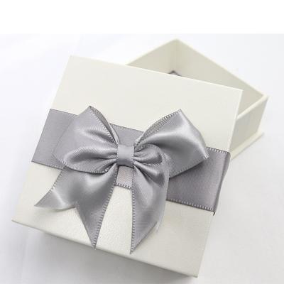 China Luxury PU Leather+White Display Ring Bracelet Pendant Pretty Plastic Jewelry Gift Box Bow Necklace Packaging Gift for sale