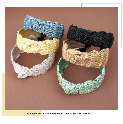 China Summer Fresh Ethnic Raffia Woven Cross Tied Headband Women Straw Braided Hair Bands For Retro for sale