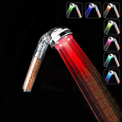 China Free Switch High Pressure Hand Held Shower Head With 7 Colors Changing Water Filter Saving Ionic Shower Head for sale