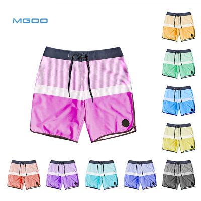 China Anti Wrinkle MGOO Recycling Plastic Bottle Cloth Board Shorts With Pockets Custom Mens Swim Trunks for sale