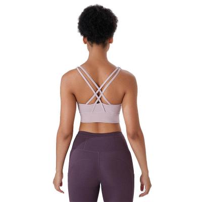 China Pretty New Breathable Custom White LOGO Workout Training Sports Women Support Bra Crossback Fitness Bandage Yoga Crop Tops With Strap for sale