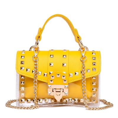 China Large Capacity Fashion Messenger Bag Chain Female Rivets Clear Square PVC Jelly Bag Shoulder Bag Transparent Handbag for sale