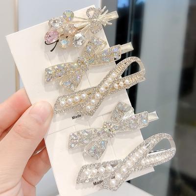 China Jiamu Amazon Fashion Hot Selling Fashion Butterfly Rhinestone Pearl Hair Clips Metal Bow Soft Single Hair Clips Hair Decoration For Women Girls for sale