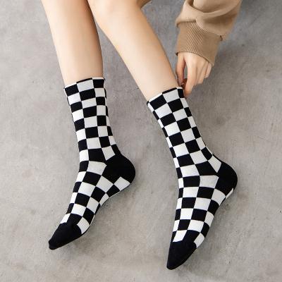 China Daily Life + Custom Sports Factory Grid Fashion Men's and Women's Cartoon Black and White Square Socks for sale