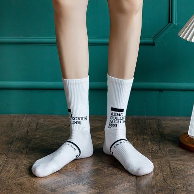 China Wholesale china daily life+sports socks china wholesale factory custom skateboard letter words LOGO socks for sale