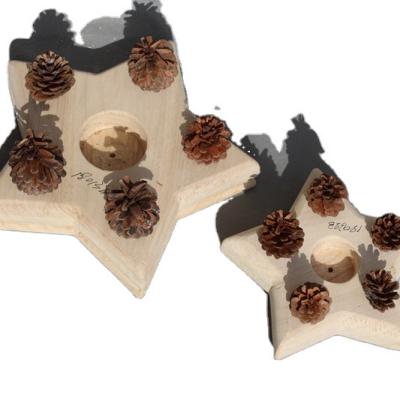 China Handmade Paulownia Crafts Home Supplies Plant Decoration Wooden Star Shaped Candle Holder Sets for sale