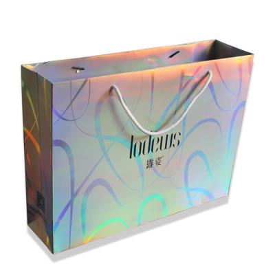 China Recyclable Custom Holographic Cosmetic Hair Wigs Clothing Carrier Gift Logo Printing Advertising Glitter Hologram Foil Paper Bag for sale