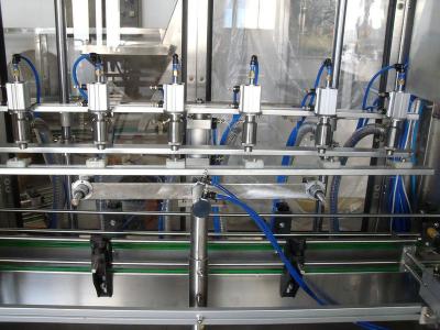 China Volume Adjustable Rotary Liquid Filling Machine For Honey / Milk / Beverage for sale