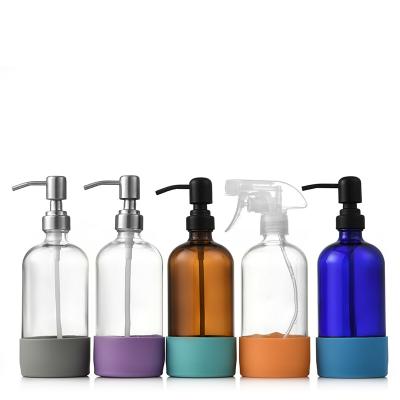 China Hot Selling Clear Amber Silicone Hand Sanitizer Bottle Personal Care Hand Spray Bottle Empty Sanitizer Bottle Holder for sale