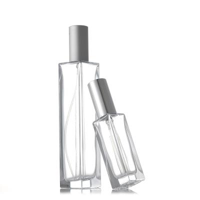 China Personal Care Wholesale 10ML 20ML 30ML Luxury Refillable Clear Empty Square Shaped Spray Glass Perfume Bottle for sale