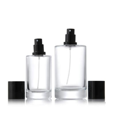 China Luxury Personal Care Fancy Crimp Glass Empty Perfume Bottles 50ml 100ml Perfume Bottle With Pump for sale