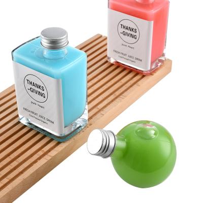 China 180ml Fancy Empty Beverage Clear Ball Shaped PET Juice Bottle Pet Ball Shaped Cosmetic Bottle Glass for sale