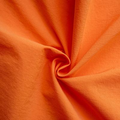 China Waterproof Nylon Spandex Taffeta Plain Solid Stretch Fabrics For Garment Clothing Lining for sale