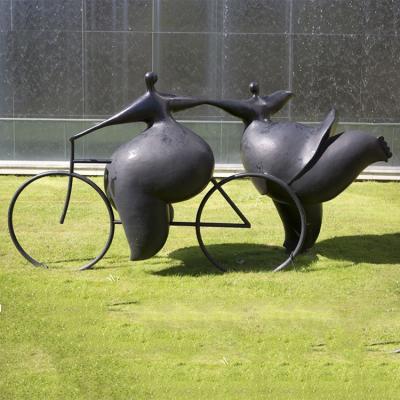 China Modern Bronze Abstract Bike Riding Dancing Women Fat Women Europe Decoration Woman Sculpture Outdoor Decor for sale