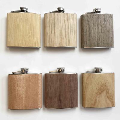 China Bamboo Men Small Mini Bottle Hip Flask Wooden Grain Liquor Travel Pocket Wine Jug Whiskey 304 Stainless Steel Minimalist Portable Liquor for sale