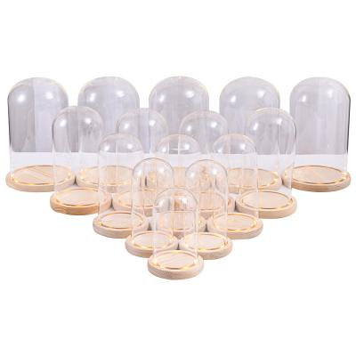 China China wholesale handmade decorative clear led glass bell battery operated mini bell glass dome with wooden base for sale