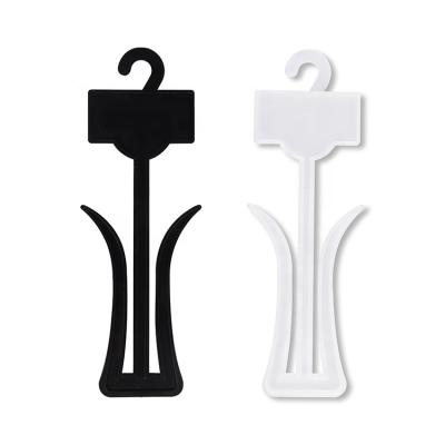 China Eco-friendly high quality flexible hooks for sturdy plastic black and white shoes display hangers for sale