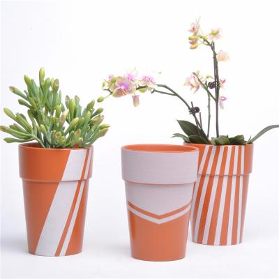 China Eco-friendly Western Planters Terracotta Color Art Pattern Planter Cheap Orange Flower Pot For Balcony for sale