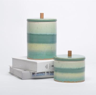 China Sustainable Kitchen Storage Jars Modern Unique Design Ceramic Canister With Wooden Lid for sale