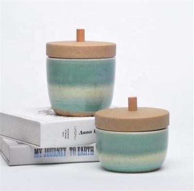 China Sustainable Hot Sale Kitchen Storage Airtight Cheap Handmade Ceramic Canister With Wooden Lid for sale