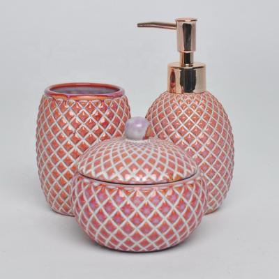 China Sustainable Handcrafted Luxury Embossed Pink Reactive Glazed Porcelain 3 Pcs Hotel Bathroom Set for sale