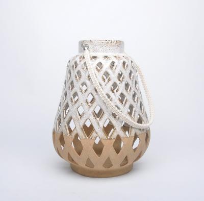 China Home Decoration Hot Selling Handmade Ceramic Hollow Candle Lantern For Candles for sale