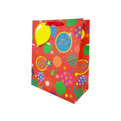 China Latest Recycled Materials Design Customize Print LOGO Kids Birthday Gift Paper Bags For Packaging for sale