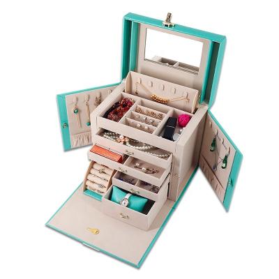 China Package Luxury PU Cosmetics Storage Box Necklace Earrings Rings Jewelry Organizer Storage Boxes Makeup Box With Lock for sale