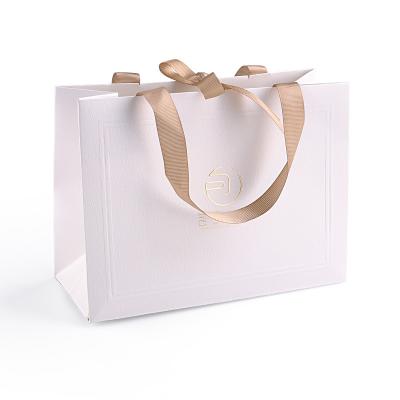 China Handle Luxury Custom Paper Pink + Silk Customized Shopping Paper Bag With Logo Printing High Quality Cheaper Paper Bags for sale