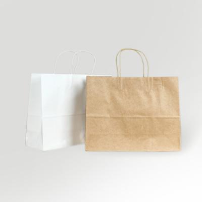 China Custom Beverage Reticle Kraft Paper Gift Bags Manufacturer Handles Reusable Shopping Bags for sale