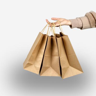 China shoes & white clothing shopping bagpaper gift bags packaging with logo printing kraft craft bags for sale