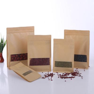 China Custom Printed Moisture Proof Flat Bottom Kraft Paper Food Packaging Ziplock Bag With Window for sale