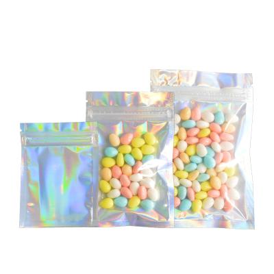 China Disposable Clear Iridescent Plastic Zipper Bags Pouches Cosmetic Plastic Laser Bags Holographic Makeup Gifts Jewelry Food Storage Bags for sale