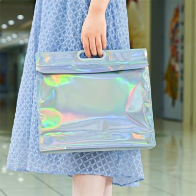 China Disposable PVC Vinyl Film Hologram Hologram Bag Holographic Cosmetics Mylar Bag With Plastic Handle for sale