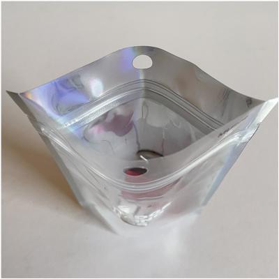 China Zipock Disposable Custom Resealable Hologram Aluminum Foil Mylar Sponge Packaging Hologram Plastic Cosmetic Bags for sale