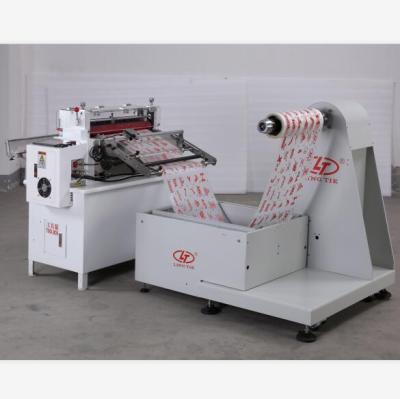 China High Precision Printed CLOTHING Label Sheet Cutting Machine for sale