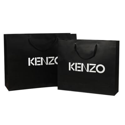 China Rope Handle Customized Recyclable Luxury Boutique Shopping Packaging Printed Kraft Paper Gift Bags With Logo for sale