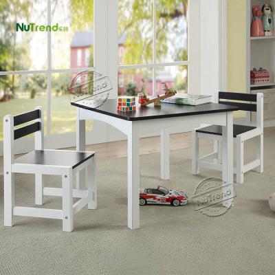 China Simple Modern Wooden Modern Kids Writing Table And Chairs for sale