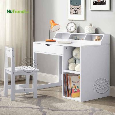 China Multiple Storage Space for Stationery and Books New Model and Design Wooden Ergonomic Kids Table Chair and Chair Table Furniture Kids Table Sets for sale