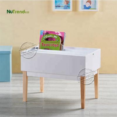 China Portable PANEL Magazine Storage Shelf White Wooden Kids Furniture With Solid Feet for sale