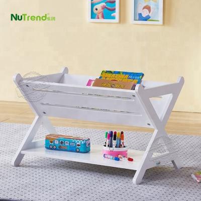 China Modern PANEL Design Home Portable Bookshelf Kids Magazine Newspaper White Wooden Shelf With Solid Legs for sale