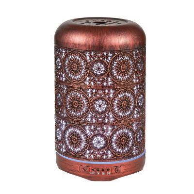 China 2021 Newest Hotel Iron Art Hollow Design 250ml Large Capacity Red Bronze Aromatherapy Diffuser for sale