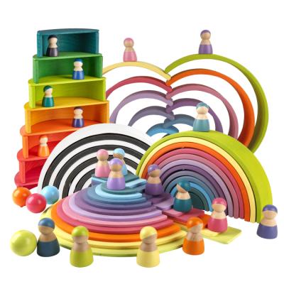 China Pine Wood 12 Pcs Arch Colorful Educational Wooden Tower Stacker Rainbow Montessori Wooden Toys For Kid for sale